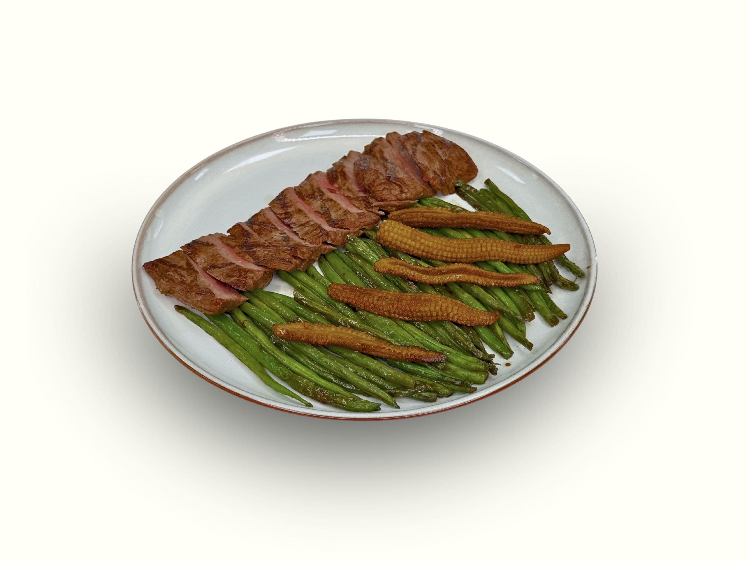 Beef steak with green beans